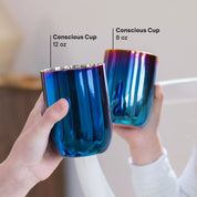 Two blue cups held by hands, labeled 'Conscious Cup 12 oz' and 'Conscious Cup 8 oz'.