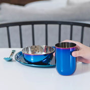 Blue stainless steel 9 inch plate, 12 ounce cup, 14 ounce bowl, spoon, and fork.
